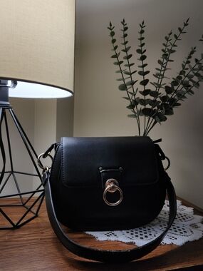 Badgley Mischka Classic Black Shoulder Saddle Bag with Gold Ring Accent